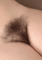Kitty spreads her legs and lets the fur spill out., Kitty (kit027) ATK Natural & Hairy: Kitty (Kitty spreads her legs and lets the fur spill out.)